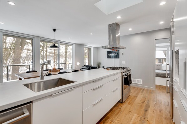 This modern tiny house kitchen has everything you need!