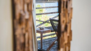 ・[Balcony] Chairs are set up so that you can relax while gazing at the sea.