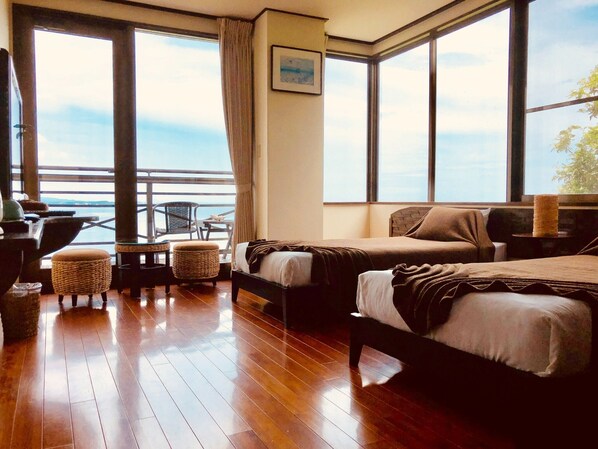 ・ [Western style twin] 1 extra bed. The sea that spreads all over the window