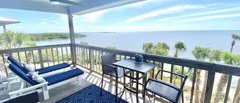 Spacious balcony with plenty of seating and first row seat to dolphin watching!