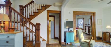 Entry and with beautiful original woodwork.
