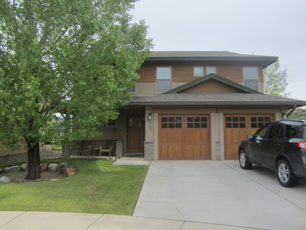 2 parking spaces in driveway and 1 in garage; excess parking in culdesac spots