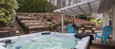 Enjoy the six person hot tub in secluded backyard.