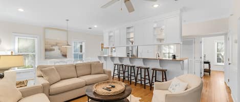 Living area with view of kitchen and dining area