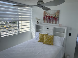 Queen bed with fan and A/C  Ocean and El Yunque views