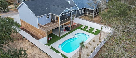 Large backyard with pool and games