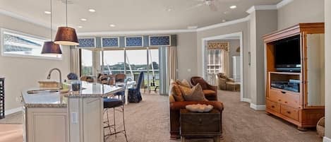 2nd Level sitting area, dining , porch and kitchen