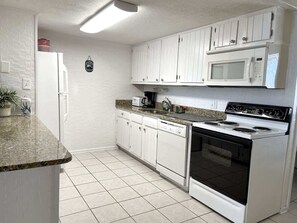 Full Kitchen with Ample Counter Space, Cabinets, Fridge, Stove with Oven, Microwave, Small Appliances, Cookware, Dishes, Flatware, Utensils (FOR A TOTAL OF 3 KITCHENS)