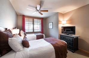 "Bedroom","Room","Indoors","Ceiling Fan","Bed"