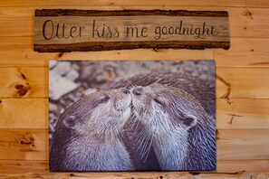 We love this sign and picture.  Isn't the Otter (King) bedroom picture adorable?