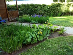 Front flower beds and ramp to the front door.