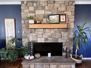 Walk into the main living with this gorgeous fireplace to greet you! 