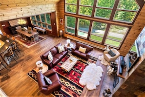 Bird's eye view of the main living room w/ gas fireplace.