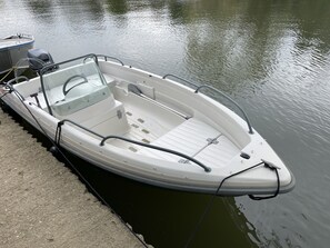 Boat located on the river side behind the main house 