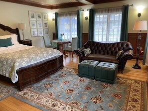 Main room, with Queen bed, sitting area and eating area