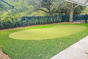 The Treehouse boasts its own private putting green!