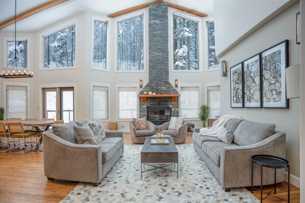 Living room looking into the pine and larch forest. Hence, The Woods name. 