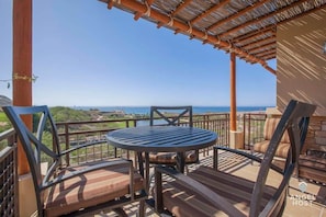 Sit on your private terrace & enjoy the golf course & sea views anytime!