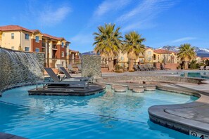 Community pool with nice lounging area