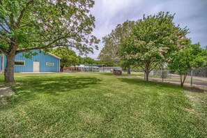 Huge lot with not 1 but 2 homes!! The Barndominium sleeps 14 and so does the Country Haus!