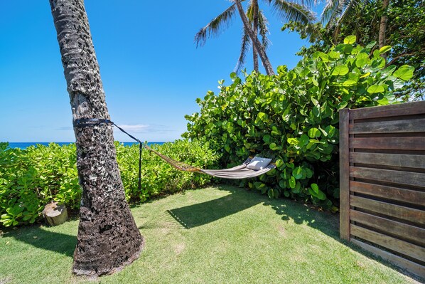 Relax in the shade and listen to the sound of the waves.