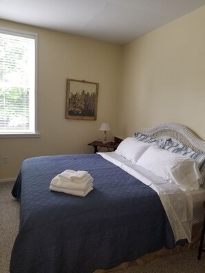 Master bedroom with King bed and bathroom with shower.