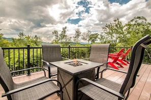 Main Floor. Exterior Deck with fire pit and unobstructed mountain views.