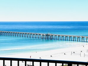 Sugar White Sand, Bright Blue Ocean Waves, and a Balcony to Relax and Enjoy!