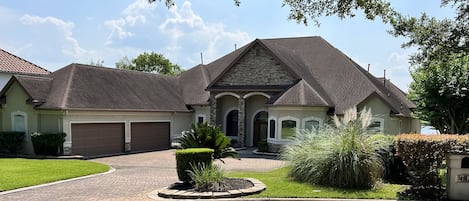 Front of home with large driveway