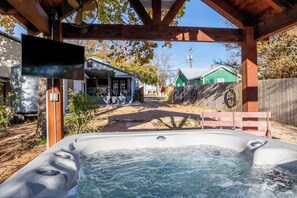 Hot Tub under covered patio with TV