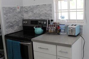 Fully equipped kitchen with all the amenities you need to make a home cook meal