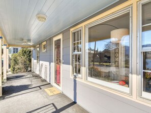 Large front windows offer a perfect view of lake!