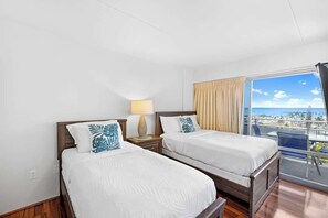 Two cozy and comfortable beds with ocean view