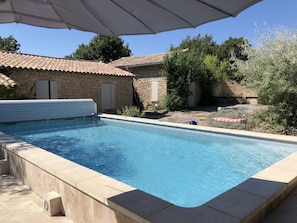 Pool with house behind

