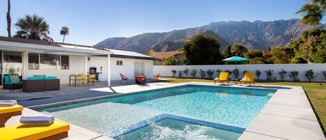 Fabulous resort style pool with plenty of chaise lounges