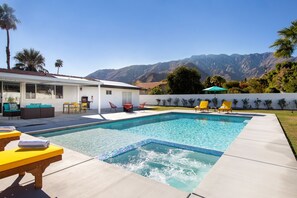 Fabulous resort style pool with plenty of chaise lounges