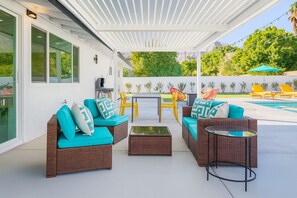 Lounge under the gazebo with brand new lush landscaping and BBQ grill