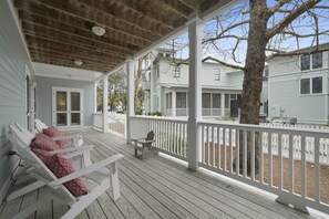 PORCH OVERLOOKS FENCED IN SIDE YARD, VERY PRIVATE