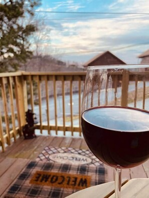 A glass of wine on the front porch