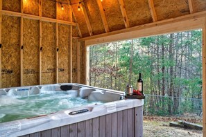 [BACKYARD] - Escape the elements, indulge in a 7-person hot tub. New decks extend the experience into the garden