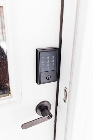 Smart lock deadbolt entry. New code with each guest!