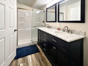 Nice shower with double vanity.