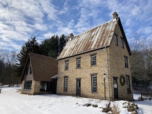 Gem of a stone house built in 1868 with summer kitchen bedroom at left.