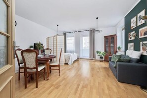 A second perspective of the living room, emphasizing its spacious and inviting layout.
