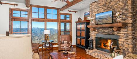 Family Room with smart TV and Fireplace