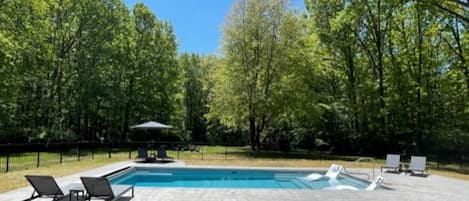 Large heated pool with sun shelf!  Plenty of room for relaxing in the sun.