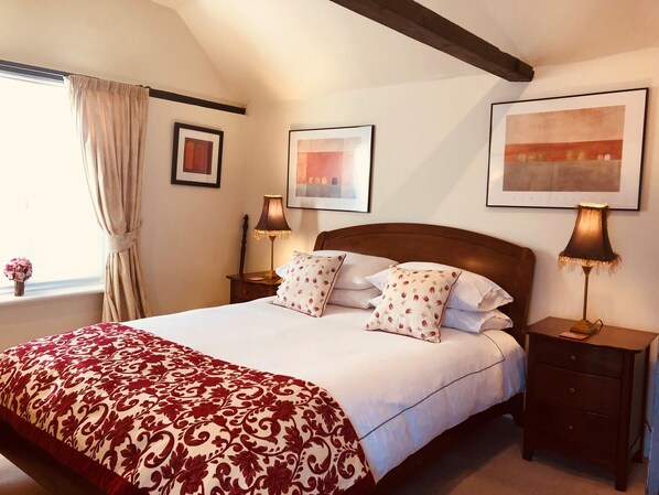 Spacious double bedroom with King sized sleigh bed