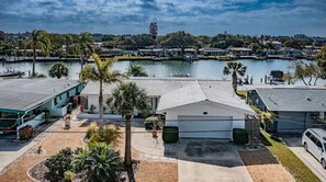 Watch the dolphins and pelicans play from the pool.