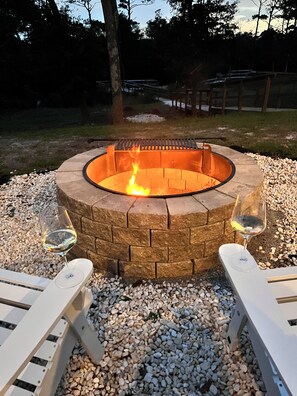 New Fire Pit with grilling setting.