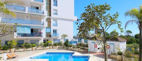 Beautiful swimming pool views from the apartment terrace